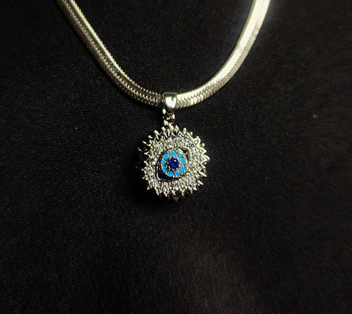 snake chain with eye stone locket