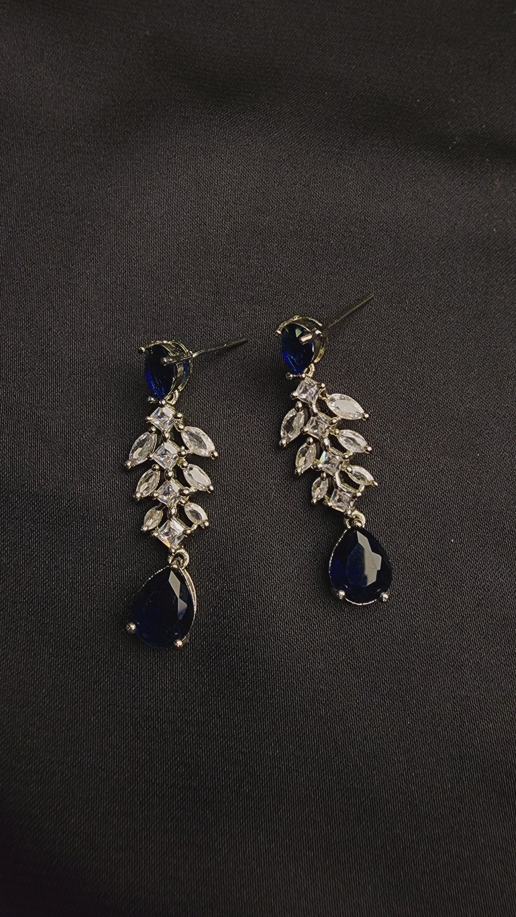 cascade of shimmering, marquise-cut cubic zirconia stones