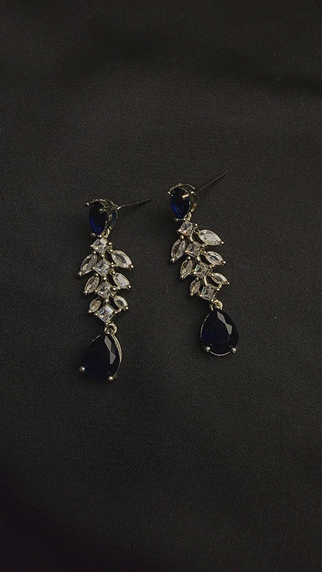 cascade of shimmering, marquise-cut cubic zirconia stones