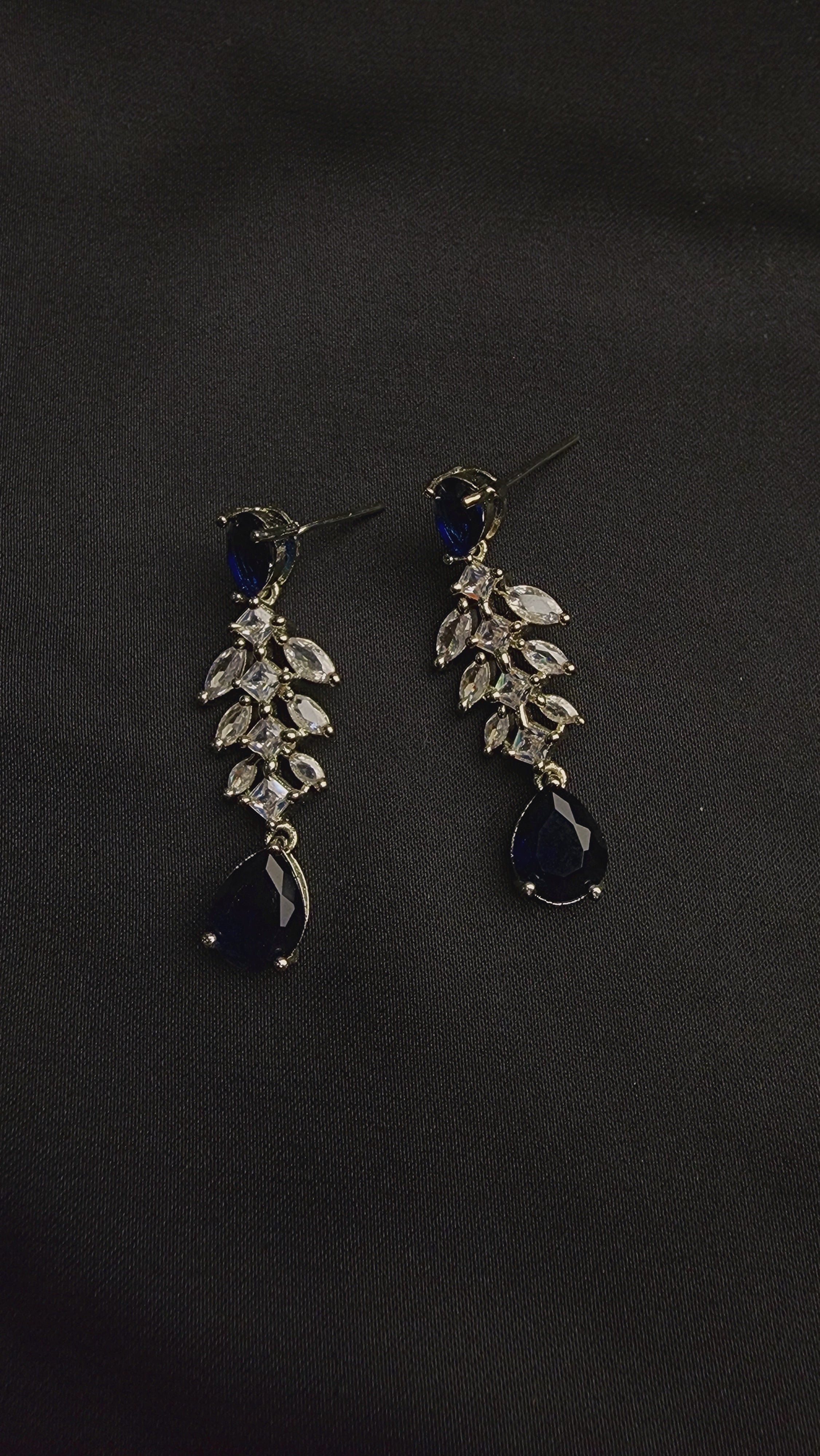 cascade of shimmering, marquise-cut cubic zirconia stones
