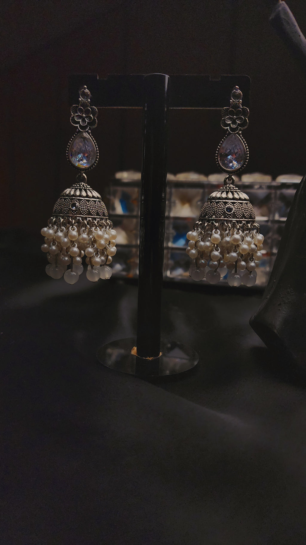 Xquisite Jhumka earrings.
