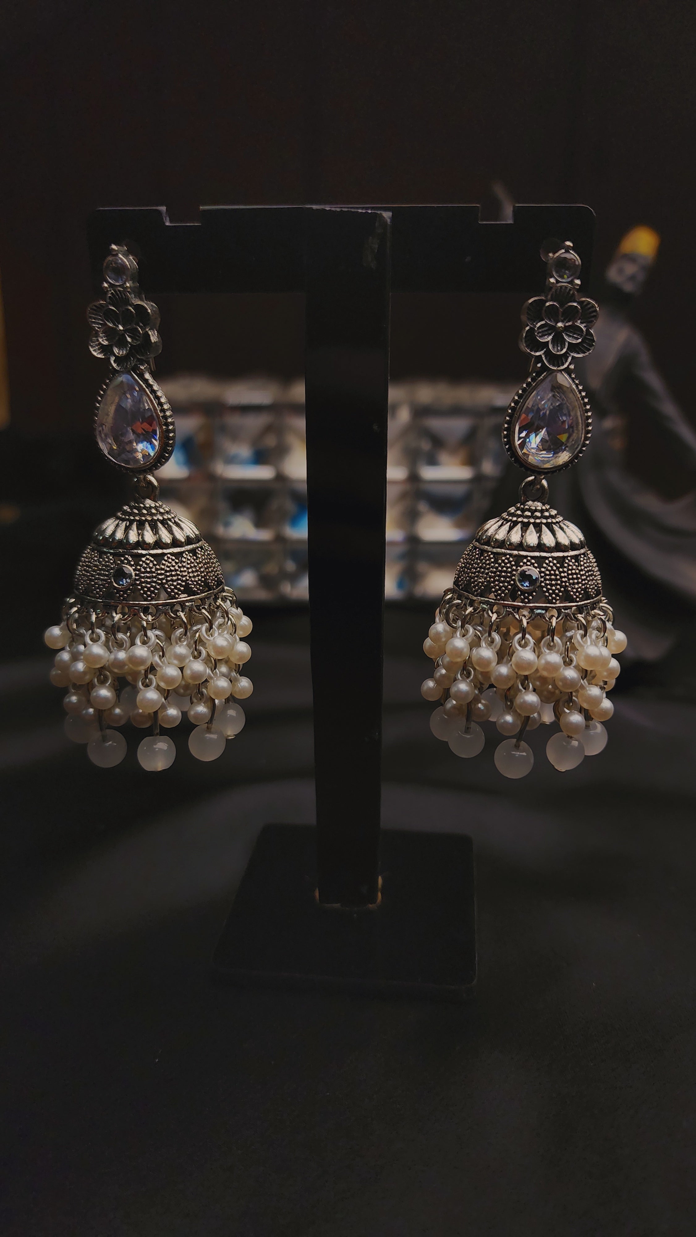 Xquisite Jhumka earrings.