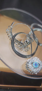 snake chain with eye stone locket
