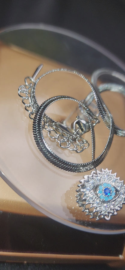 snake chain with eye stone locket